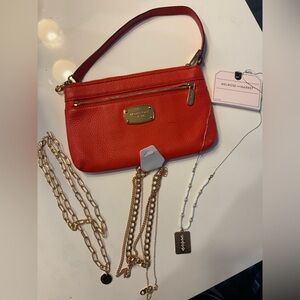 Michael kors wristlet, with gold color necklaces bundle
